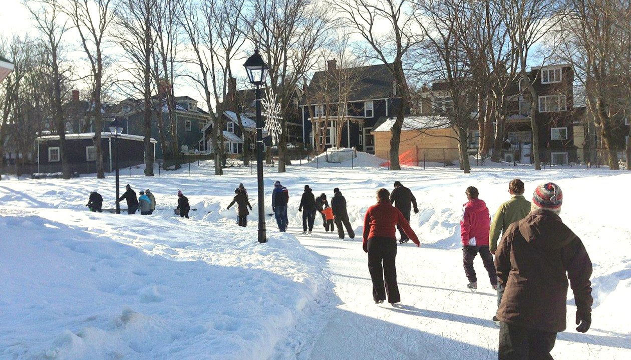 People skating on the Bannerman loop with lots of snow on the ground