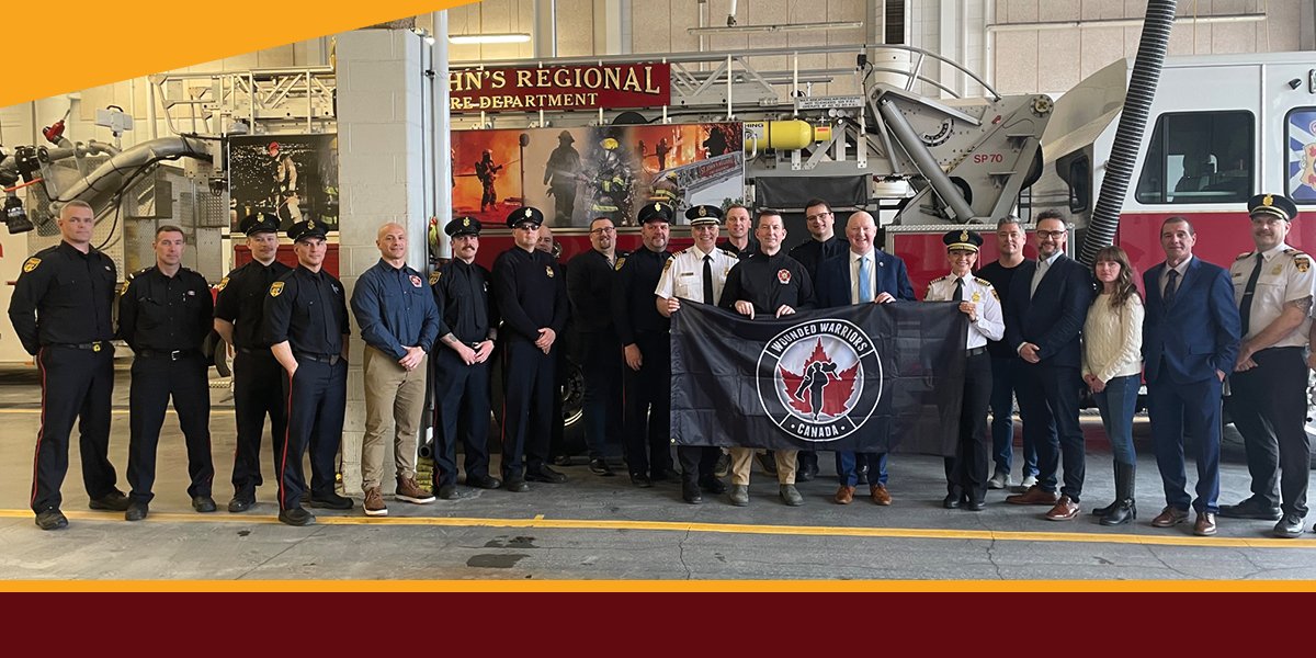 Members of SJRFD, IAFF Local 1075, CIty Councillors and  Wounded Warriors Canada.