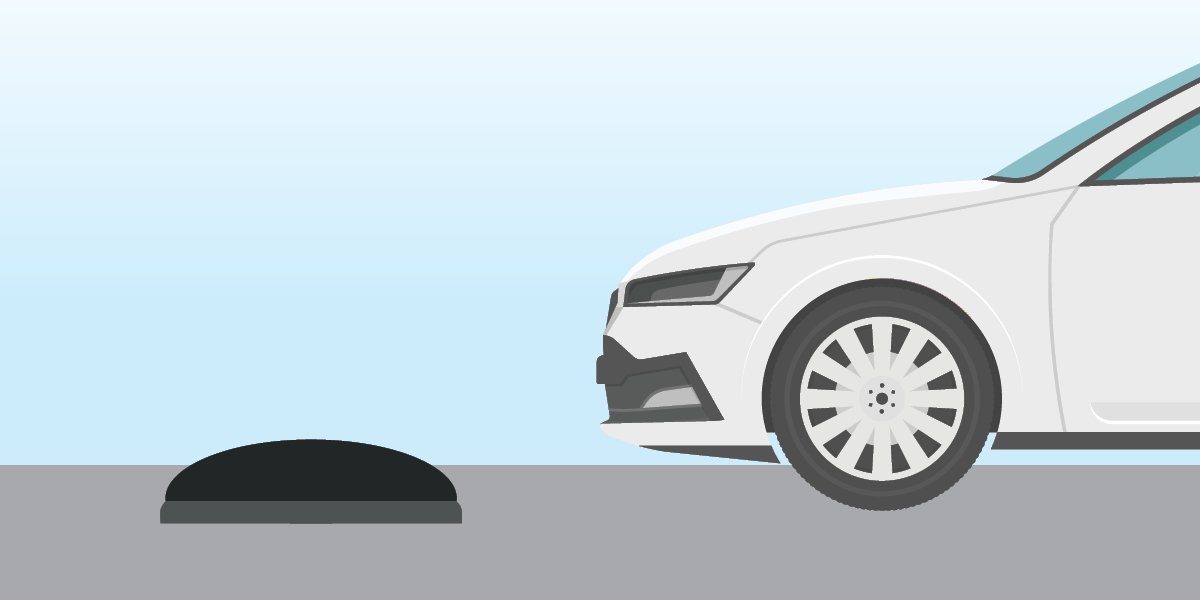 Graphic of a car and a speed bump