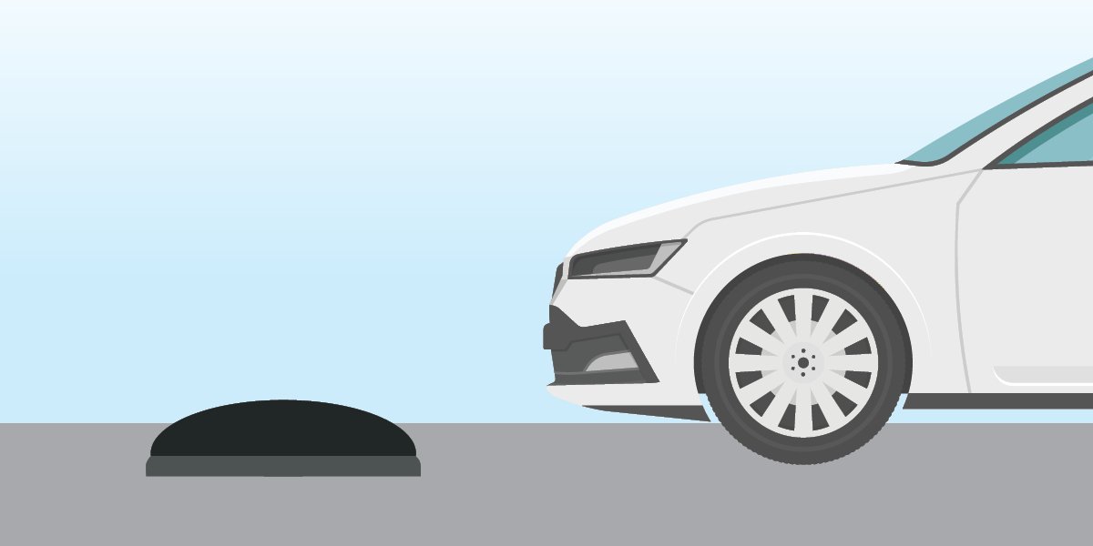 Blue background with a illustrated vehicle and a speed hump.