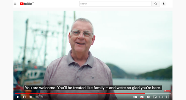 Screen shot of Mayor Breen at harbour with YouTube frame and logo