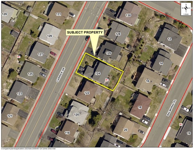 a map of a neighbourhood showing a property outlined in yellow