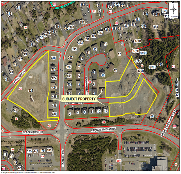 a map of a neighbourhood showing a property outlined in yellow