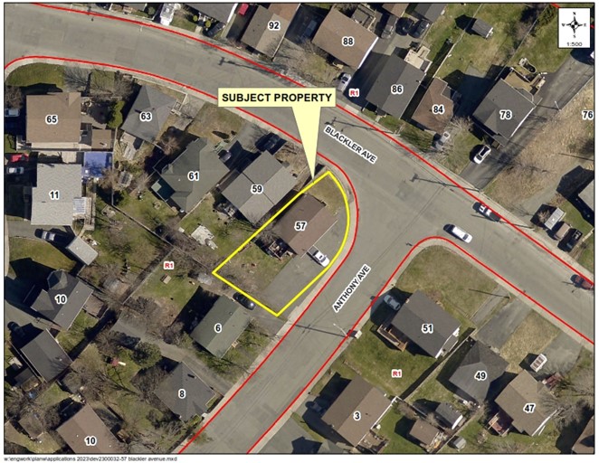 a map of a neighbourhood showing a property outlined in yellow