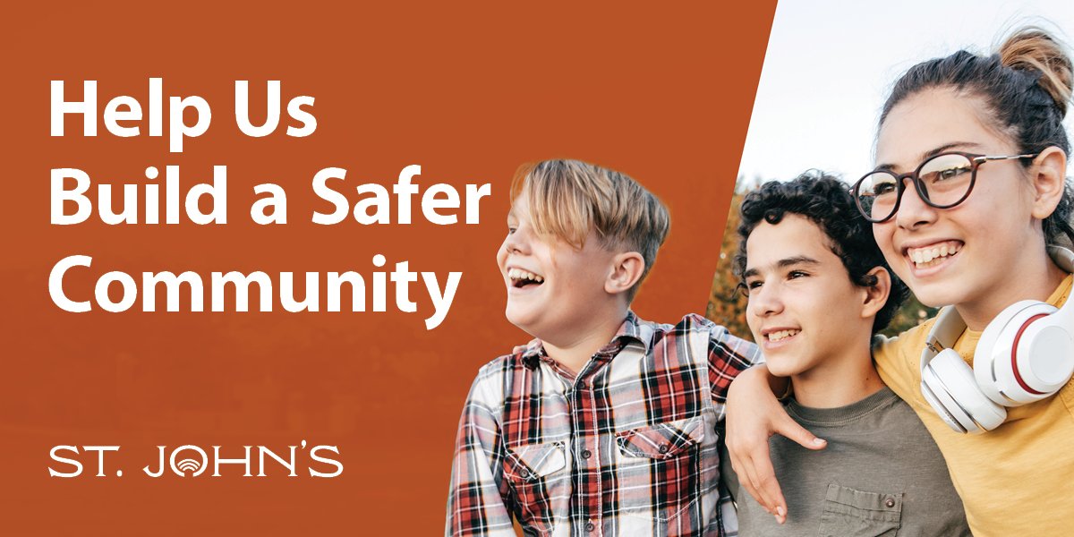 Orange background with three children and text that says Help Us Build a Safer Community St. John's