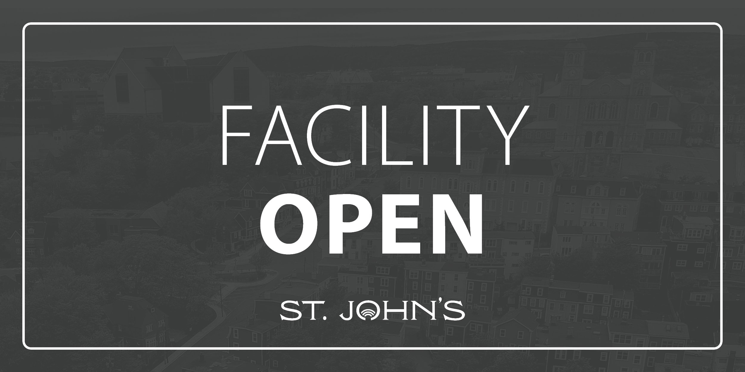 grey background with white text that says facility open