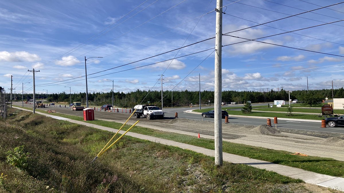 Construction work on Southlands Boulevard with trucks on road