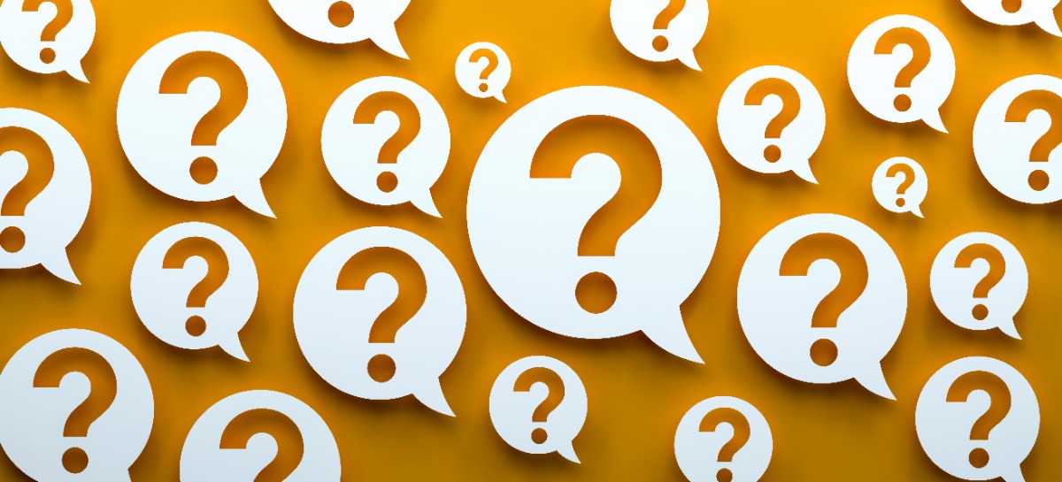 yellow background with white speech balloons showing question marks
