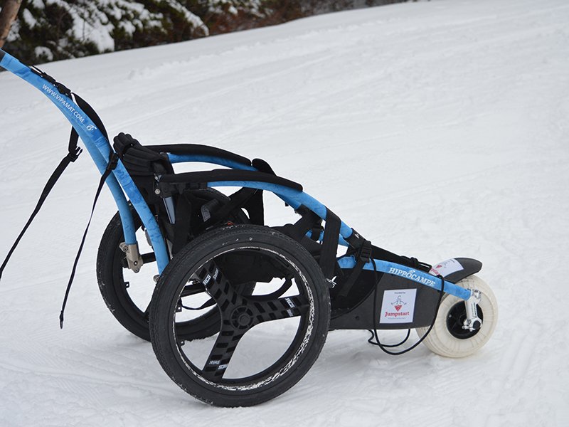 A Hippocampe, an all terrain wheelchair with three thin tall wheels