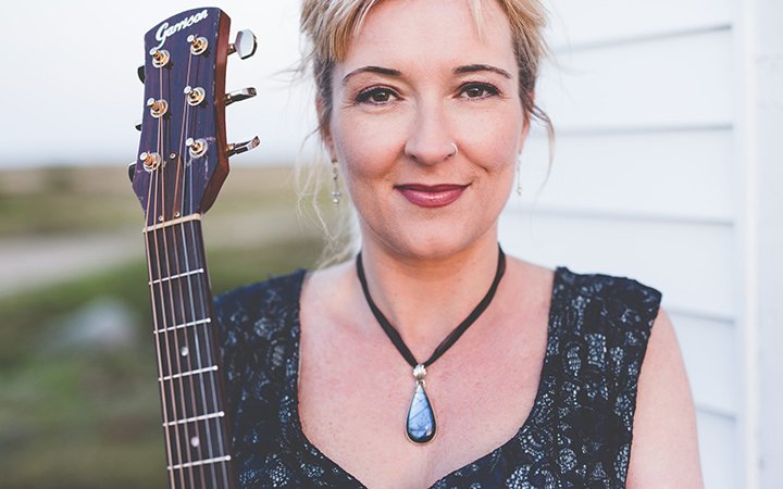 Colleen Power with guitar