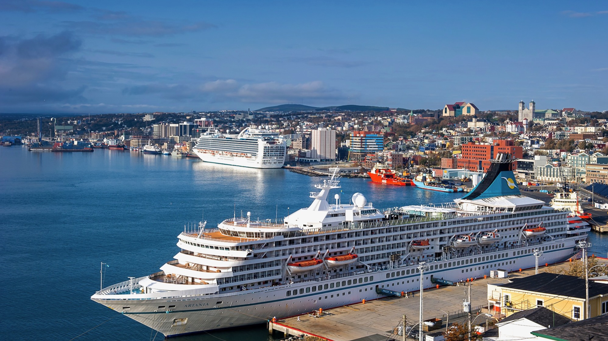 St. John's harbour wide shot showing a large cruise ship in the foreground