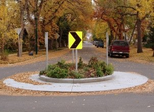 Image of a mini-roundabout Traffic calming measure on a residential street