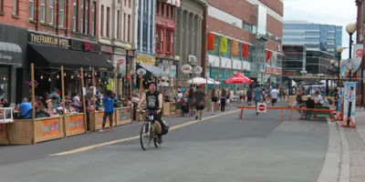 a person on a bike on the Downtown Pedestrian Mall