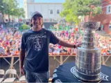 Alex Newhook and Stanley Cup on George Street