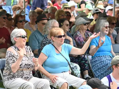 people at Party in the Park laughing