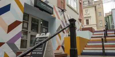 mural on stairway of Solomon's Lane