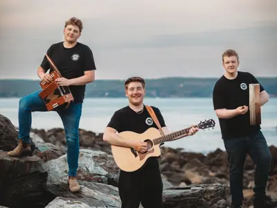 Image of three members of the band Salt Beef Junkies