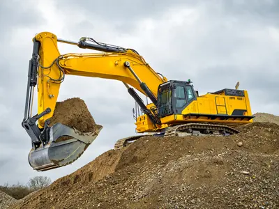 Excavator digging soil
