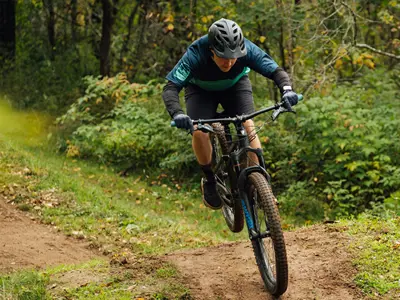 a person mountain biking