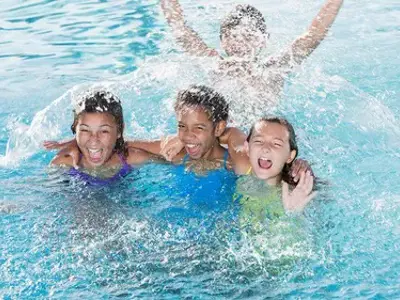 kids swimming in a pool