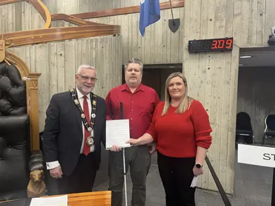 Mayor Breen, Trisha Rose, and Dwayne Morgan in Council Chambers