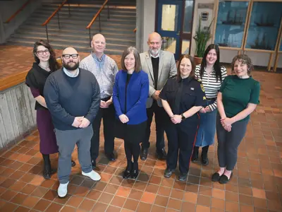 Photo of various people at St. John's City Hall