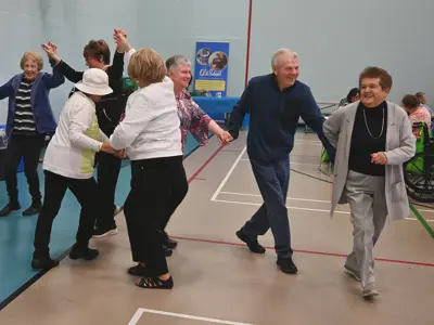 people dancing at the Seniors Day event