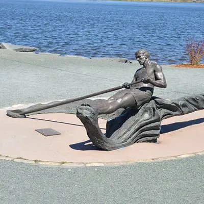 a statue of someone rowing near Quidi Vidi