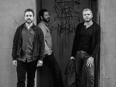 Image of three members of the band Big Space 