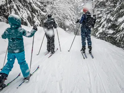 people on a trail in winter