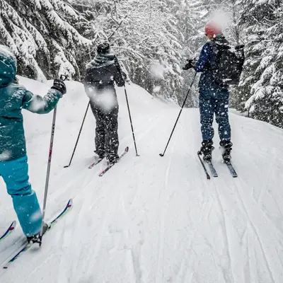 people on a trail in winter