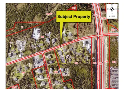 Map of a property with a yellow border around it.