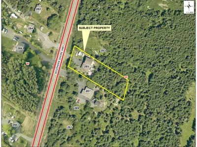 Map of a property with a yellow border around it.