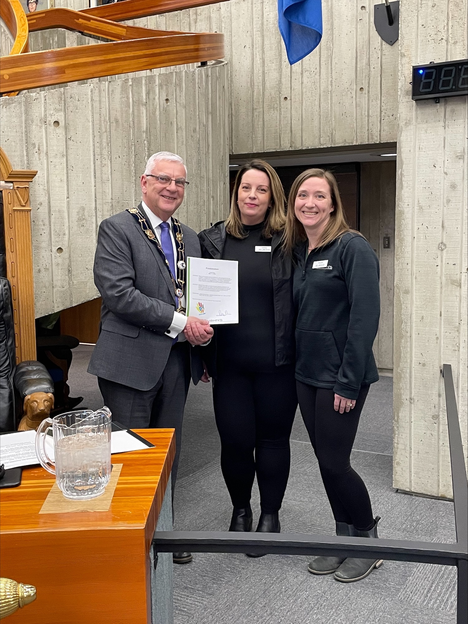 Mayor Breen and City staff holding proclamation